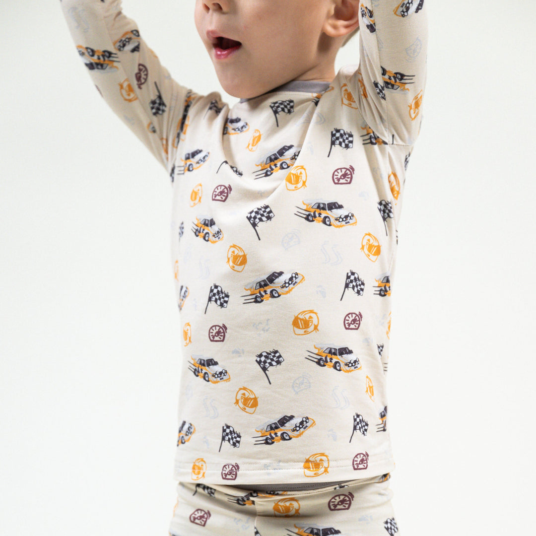 Rally Legend 2pc bamboo pajamas featuring Audi Quattro S1 Group B rally car with a yellow and white iconic livery - Gearhead Kids