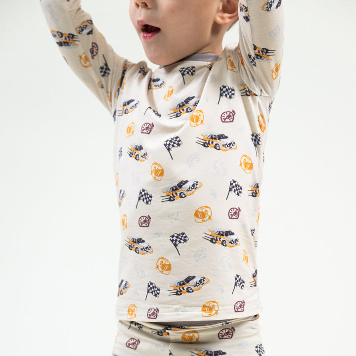 Rally Legend 2pc bamboo pajamas featuring Audi Quattro S1 Group B rally car with a yellow and white iconic livery - Gearhead Kids