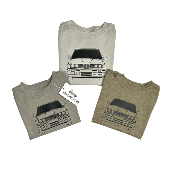 BMW E30 M3 Outline t-shirt featuring front, back, and side car profiles in olive, dust and sand - Gearhead Kids