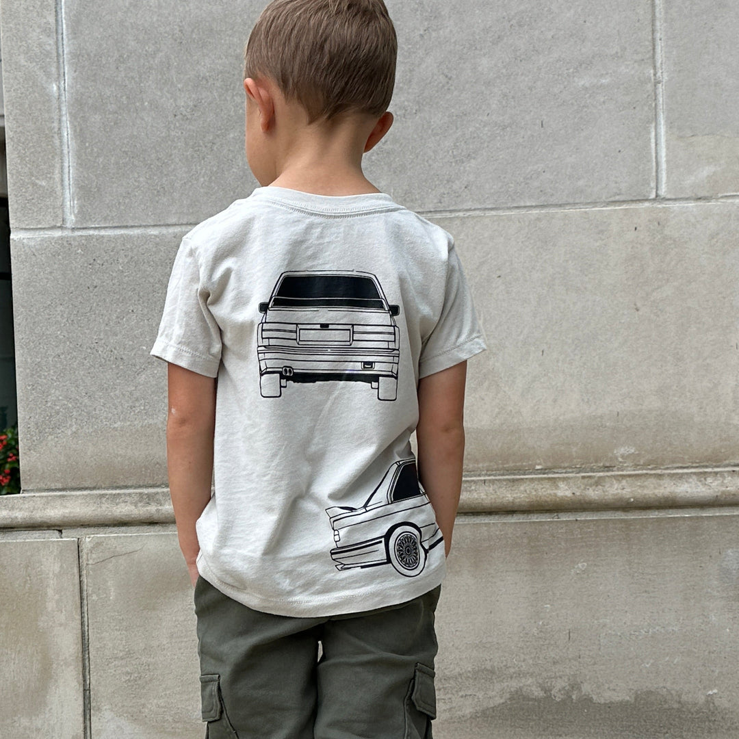 Little boy wearing a BMW E30 M3 t-shirt - back view - Gearhead Kids