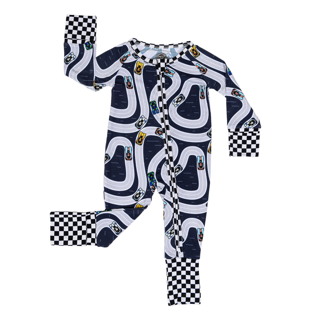 Day at the track zipper pajamas featuring Porsche 917 and the iconic liveries on a track shaped outline - Gearhead Kids