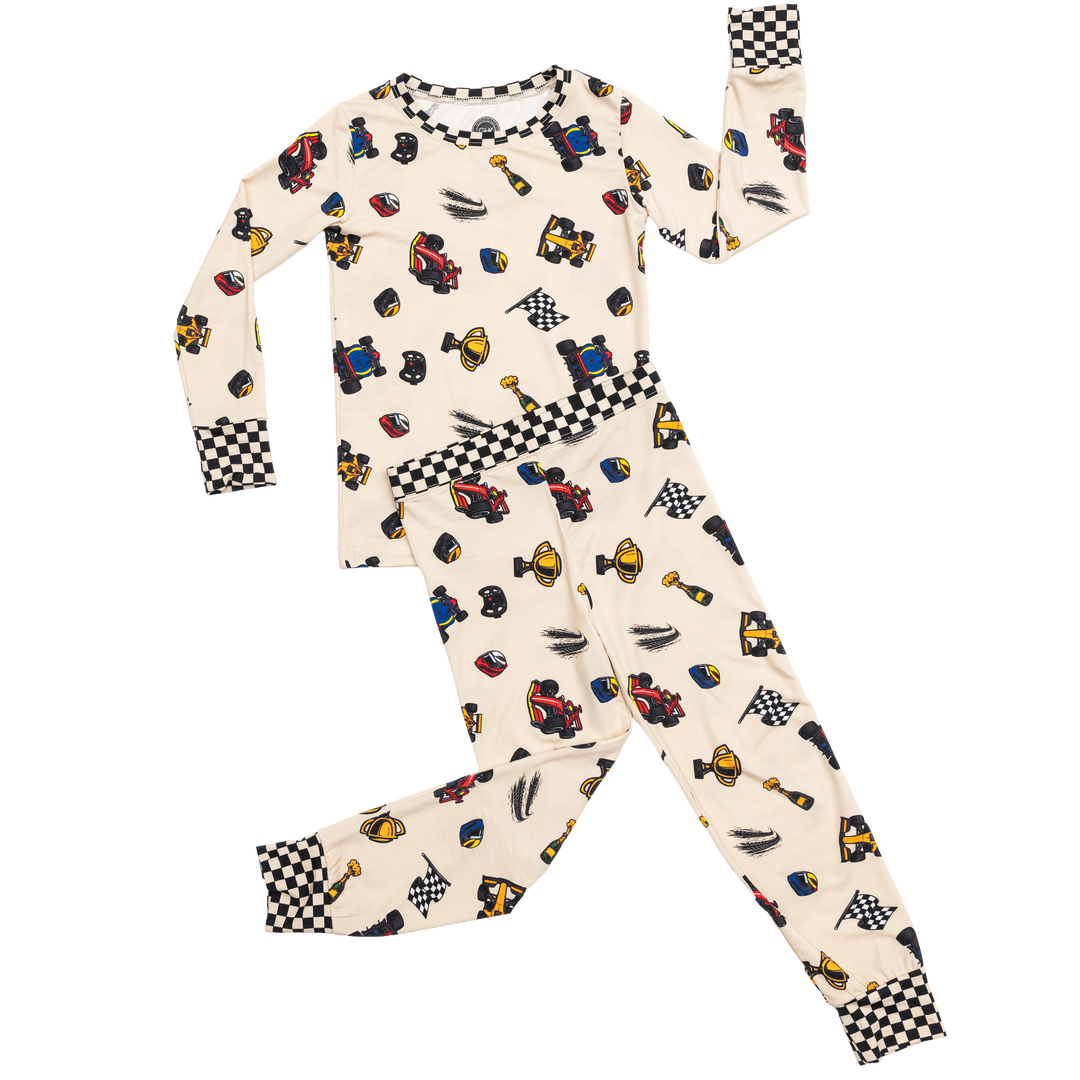 Two piece long sleeve Formula 1 themed bamboo pajamas with race cars and checkered flags. Grand Prix pajamas for kids.  | Gearhead Kids