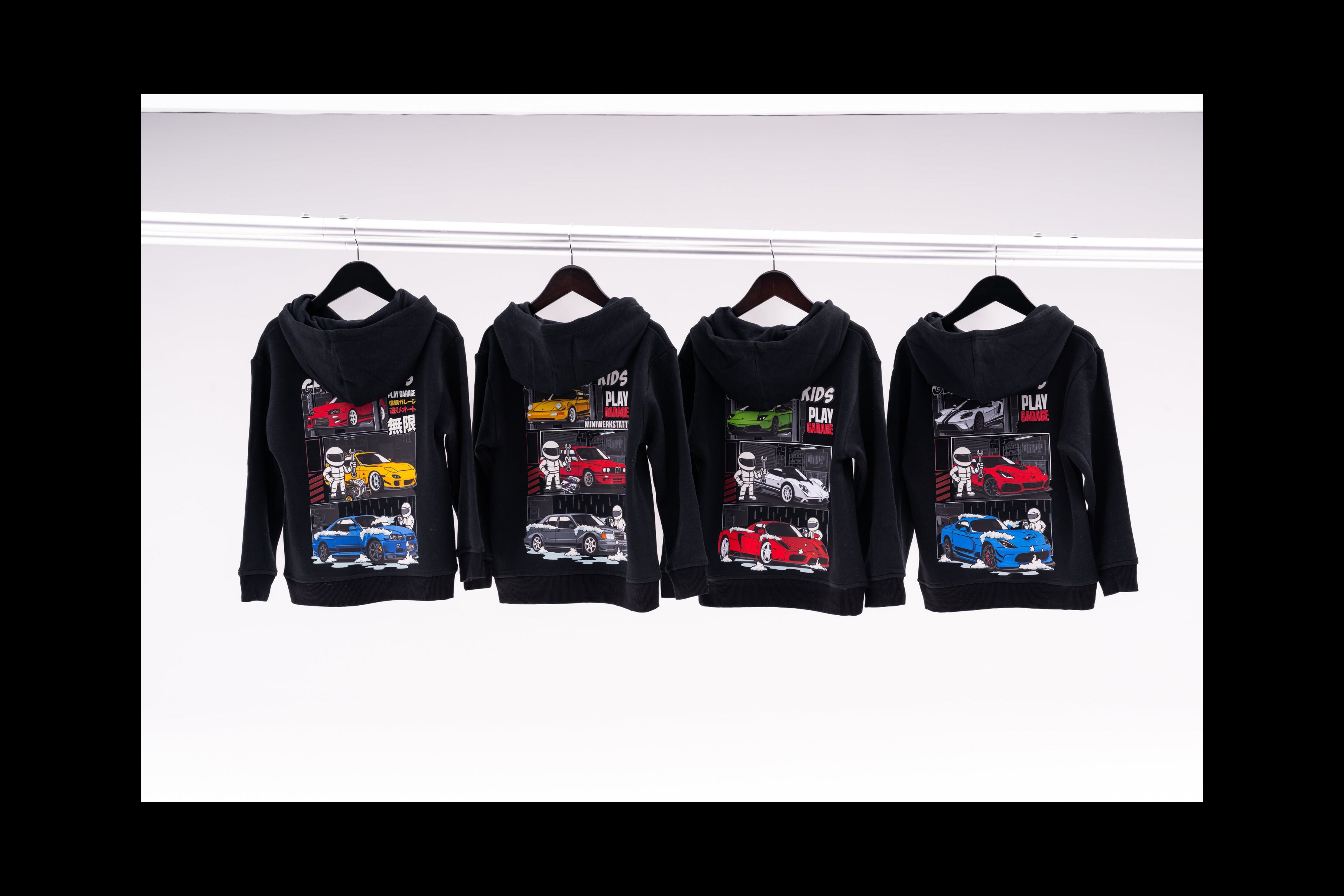 Kids Automotive themed black hoodies featuring JDM legends, German air-cooled cars, Italian Exotic Cars, and American Muscle Cars.  