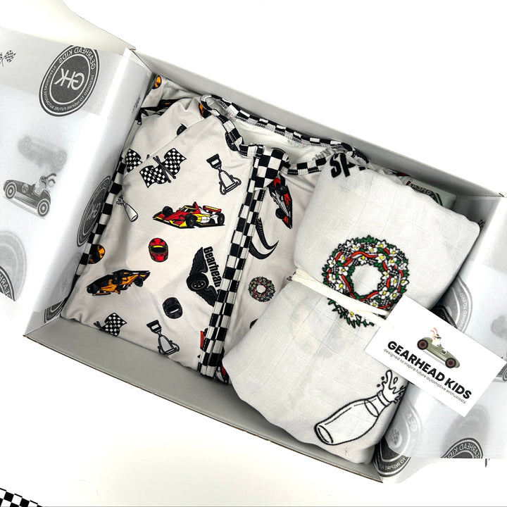 Gift set for baby with babmboo pajamas and muslin blanket featuring Indy 500 race theme and race cars.  | Gearhead Kids
