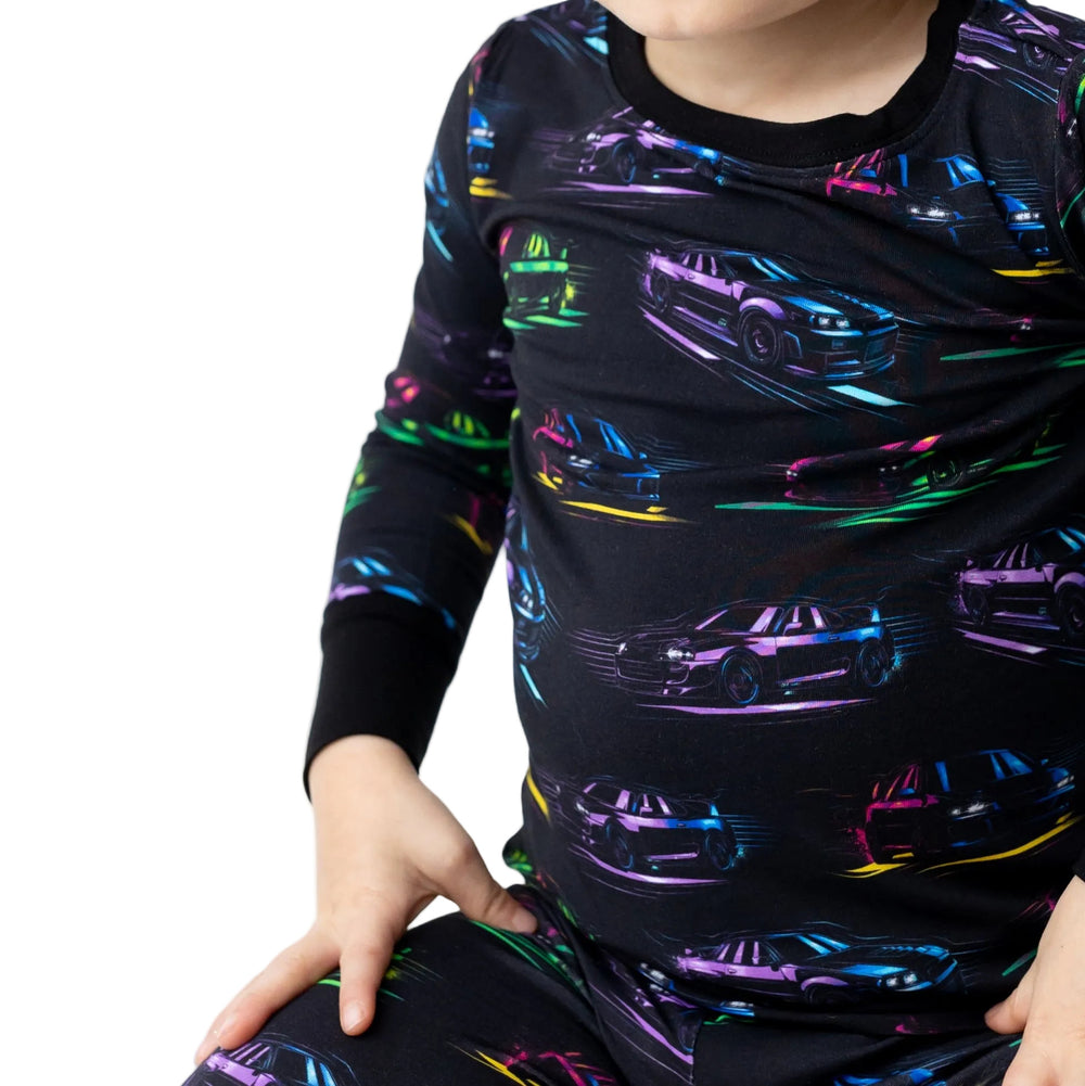 Close-up of Mazda RX7 and Subaru STI car print on soft bamboo kids pajamas- Gearhead Kids