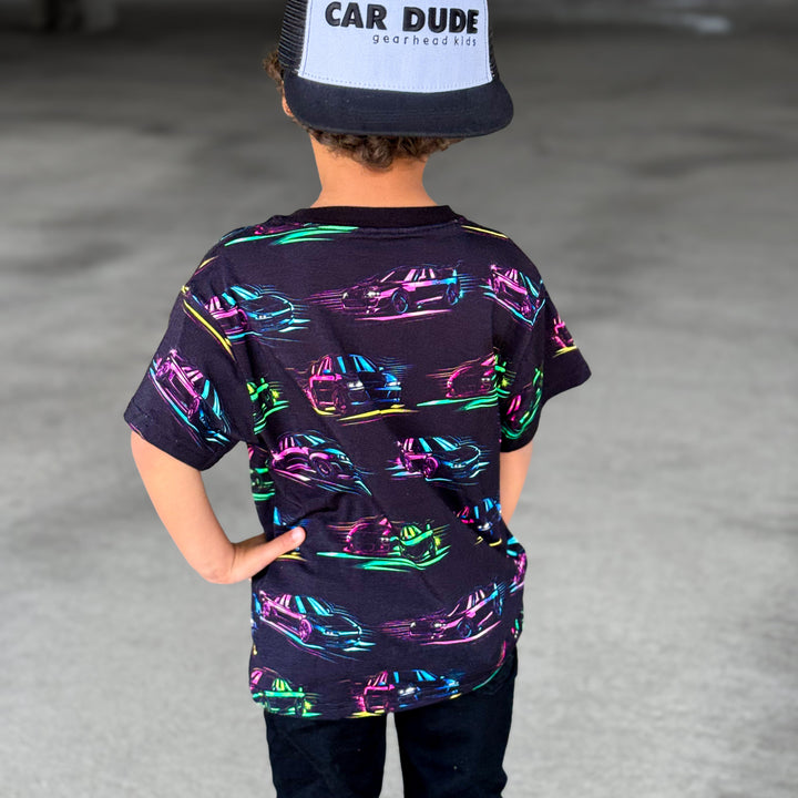 Boy wearing a JDM Car neon colors t-shirt in bamboo organic cotton featuring Acura NSX and Nissan R34 - Gearhead Kids