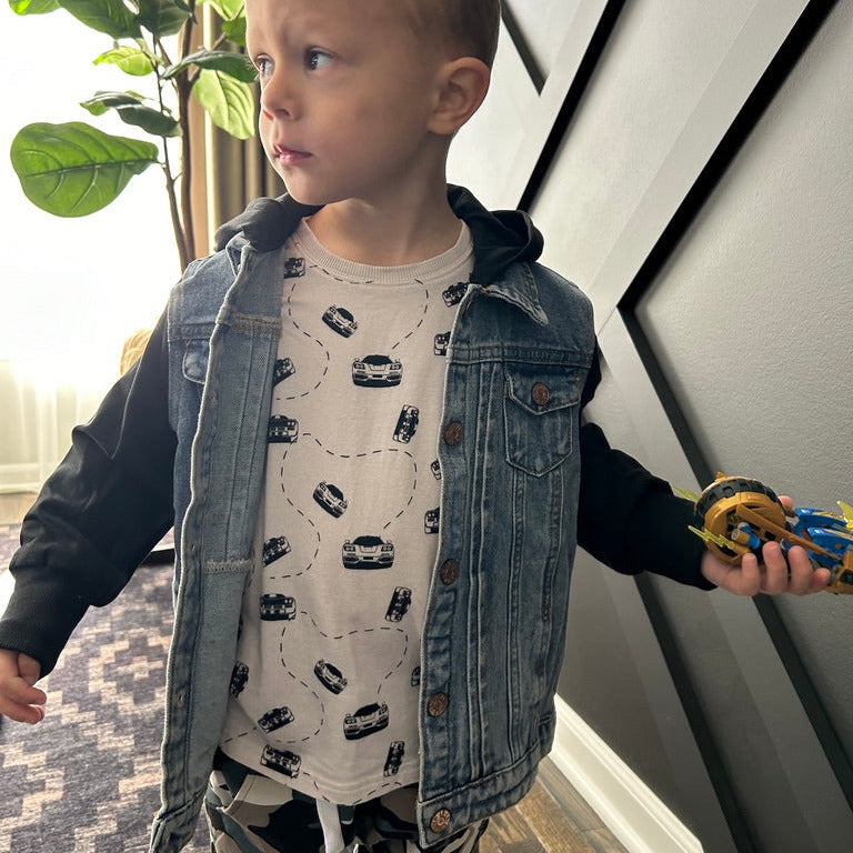 Boy wearing a McLaren F1  small silhouette t-shirt  - Gearhead Kids