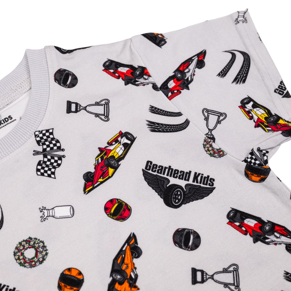 Closeup of the details on Gearhead Kid's Midnight Milk Run t-shirt for kids featuring american open wheel race cars and racing details.