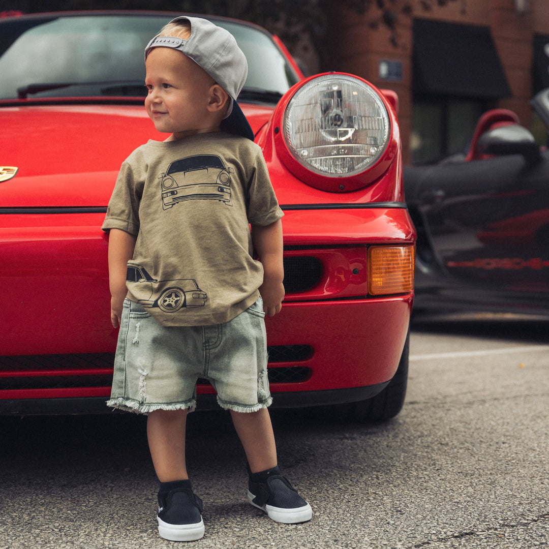 Young car enthusiast wearing the 964 air-cooled blueprint t-shirt - Gearhead Kids